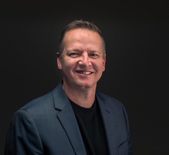 Shann Ferch playing basketball at Montana State University